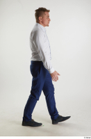  Steve Q  1 black oxford shoes blue trousers business dressed walking white shirt whole body 0004.jpg
